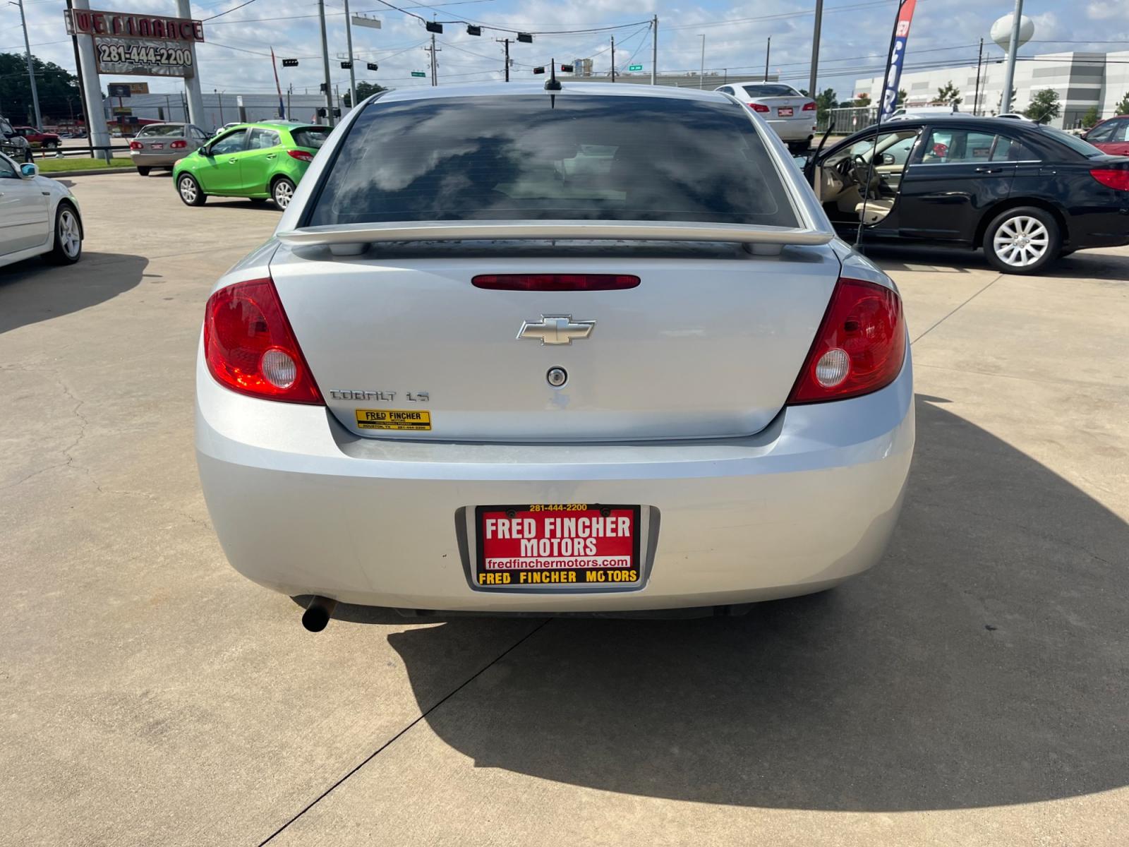 2009 SILVER /black Chevrolet Cobalt LS Sedan (1G1AS58H697) with an 2.2L L4 DOHC 16V engine, 4-Speed Automatic Overdrive transmission, located at 14700 Tomball Parkway 249, Houston, TX, 77086, (281) 444-2200, 29.928619, -95.504074 - Photo #5